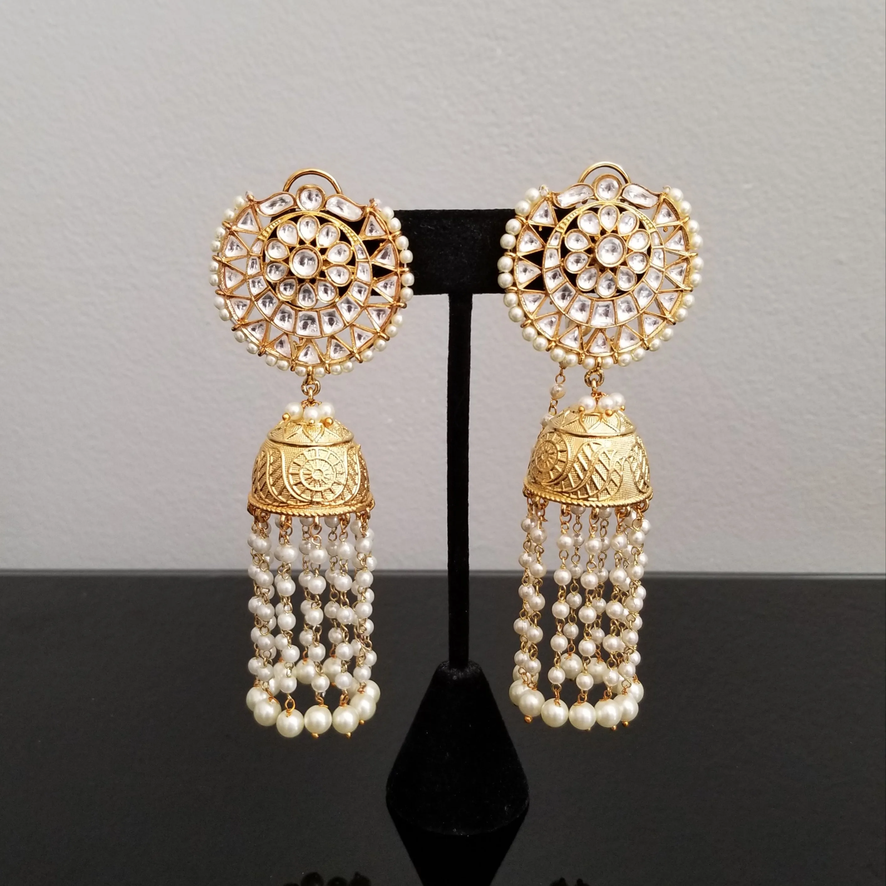 Gold Finish Long Kundan Jhumkas With Pearl Tassels