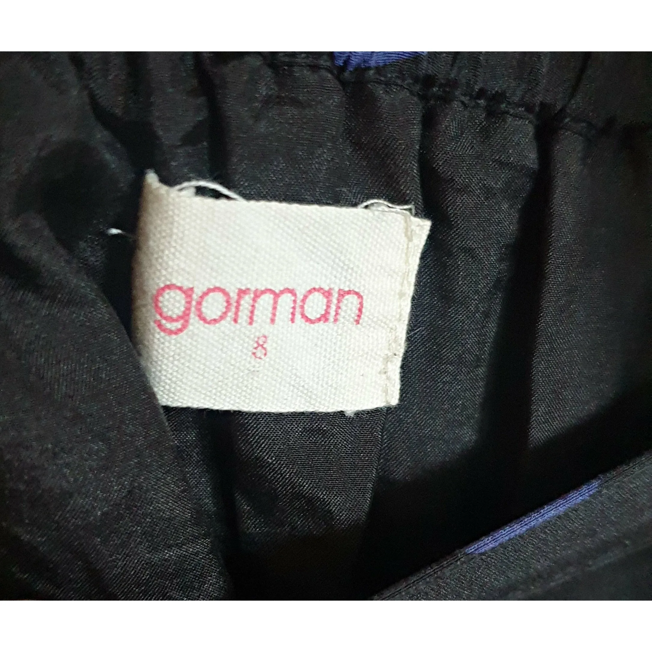 Gorman black 100% silk skirt with purple polka dots and pcokets size 8 (best fits size 6)